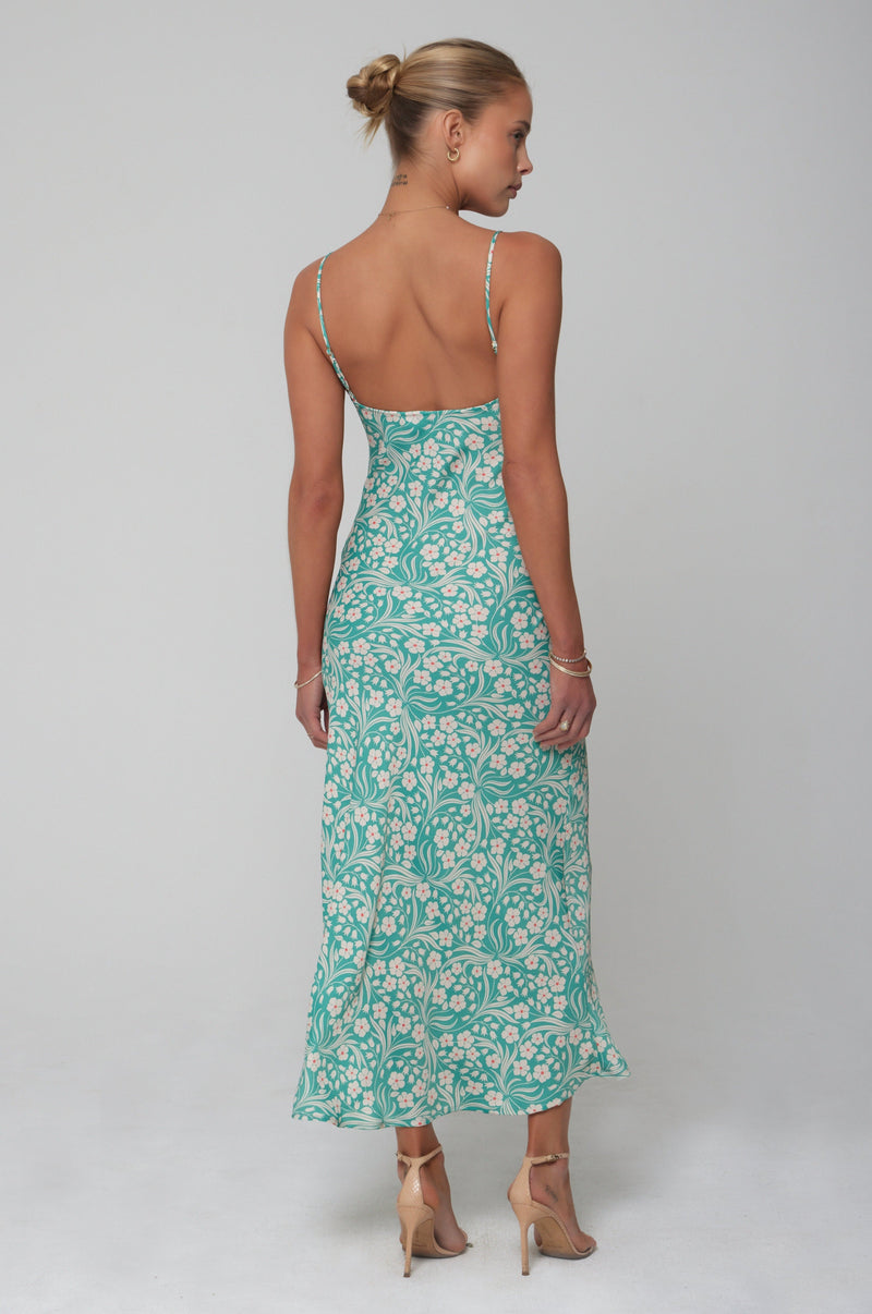 This is an image of Lily Slip in Maldives - RESA featuring a model wearing the dress