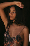 This is an image of Lily Slip in Onyx - RESA featuring a model wearing the dress
