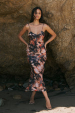 This is an image of Lily Slip in Onyx - RESA featuring a model wearing the dress