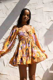 This is an image of Lyla Mini in Doheny - RESA featuring a model wearing the dress