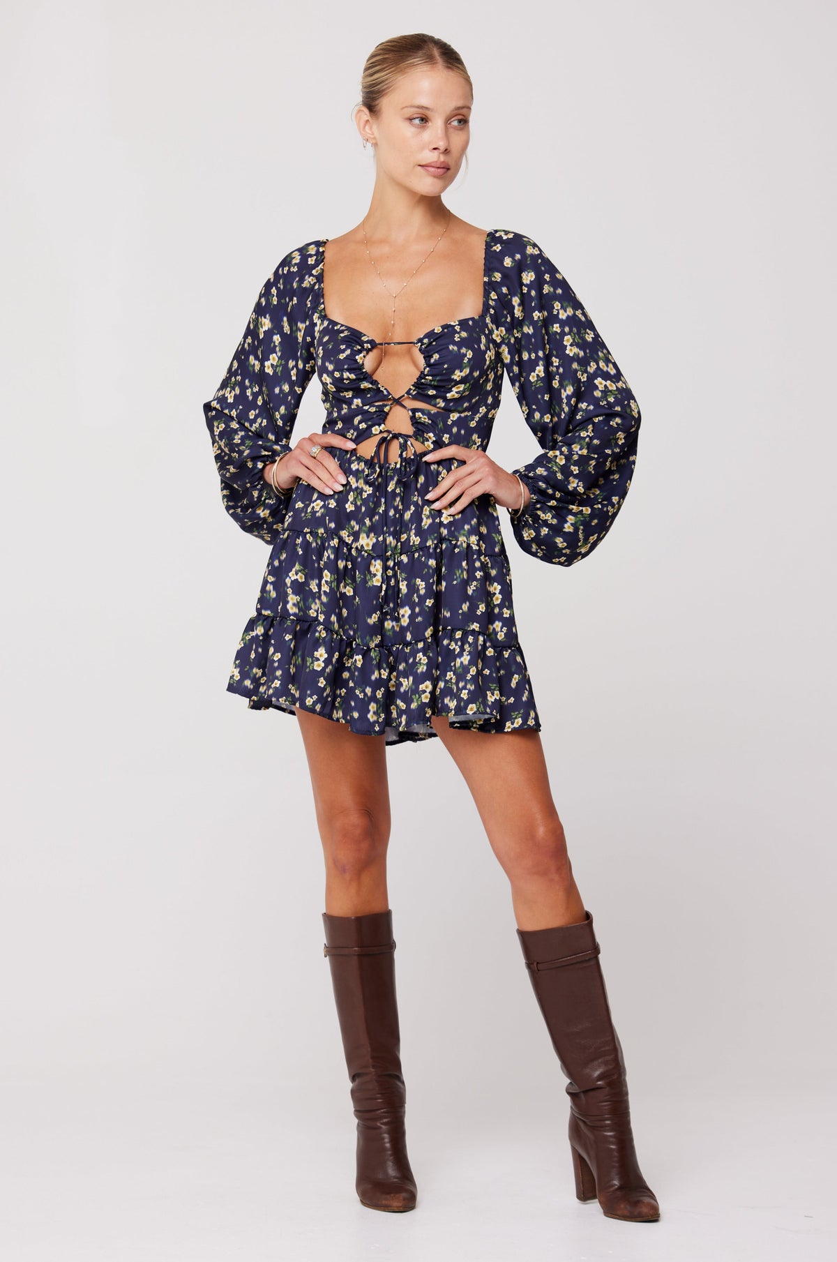 This is an image of Lyla Mini in Midnight - RESA featuring a model wearing the dress