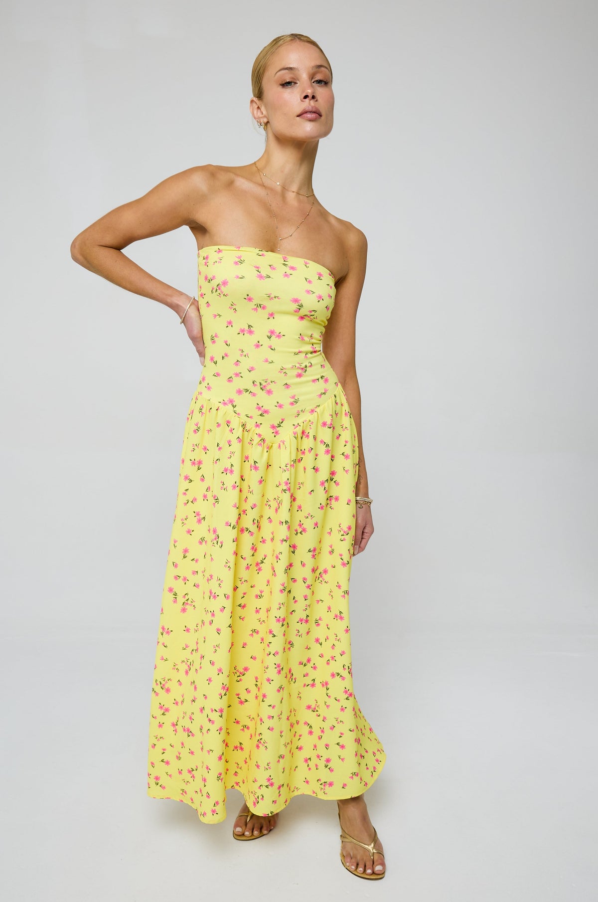 This is an image of Mackenzie Dress in Honey - RESA featuring a model wearing the dress
