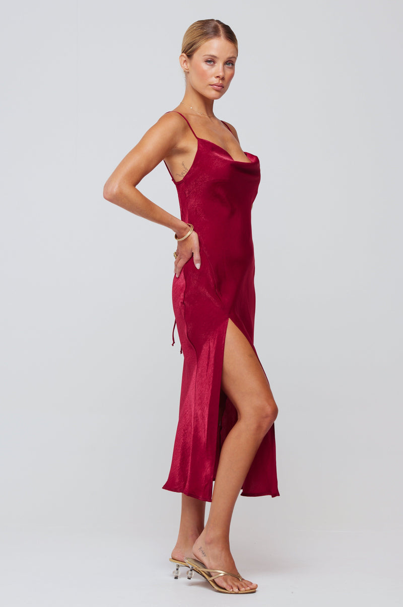 This is an image of Madison Slip in Burgundy - RESA featuring a model wearing the dress