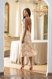 This is an image of Madison Slip in Gardenia - RESA featuring a model wearing the dress