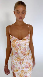 This is an image of Madison Slip in Gardenia - RESA featuring a model wearing the dress