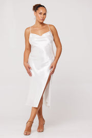 This is an image of Madison Slip in Pearl - RESA featuring a model wearing the dress