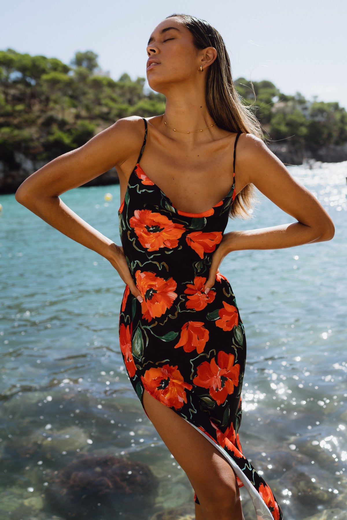 This is an image of Madison Slip in Poppy - RESA featuring a model wearing the dress