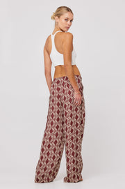 This is an image of Malcolm Trousers in Coco - RESA featuring a model wearing the dress