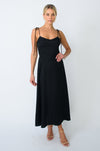 This is an image of Mandi Dress in Black - RESA featuring a model wearing the dress