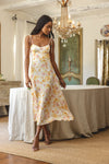 This is an image of Mandi Dress in Gardenia - RESA featuring a model wearing the dress