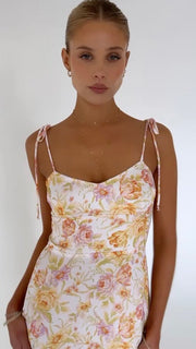 This is an image of Mandi Dress in Gardenia - RESA featuring a model wearing the dress