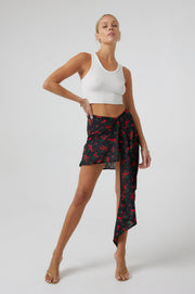 This is an image of Mila Skirt in Rosette - RESA featuring a model wearing the dress