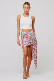 This is an image of Mila Skirt in Vintage Floral - RESA featuring a model wearing the dress