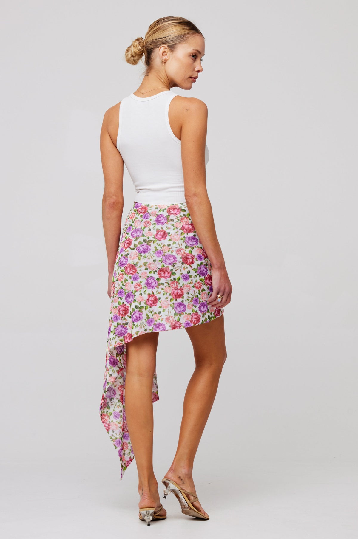 This is an image of Mila Skirt in Vintage Floral - RESA featuring a model wearing the dress