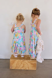 This is an image of Missy Kids in Canvas - RESA featuring a model wearing the dress