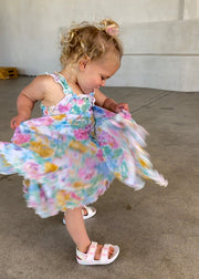 This is an image of Missy Kids in Canvas - RESA featuring a model wearing the dress