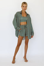 This is an image of Monica Blouse in Caribe - RESA featuring a model wearing the dress