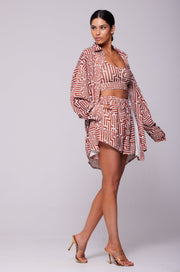 This is an image of Monica Blouse in Coconut - RESA featuring a model wearing the dress