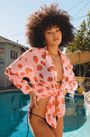 This is an image of Monica Blouse in Montecito - RESA featuring a model wearing the dress