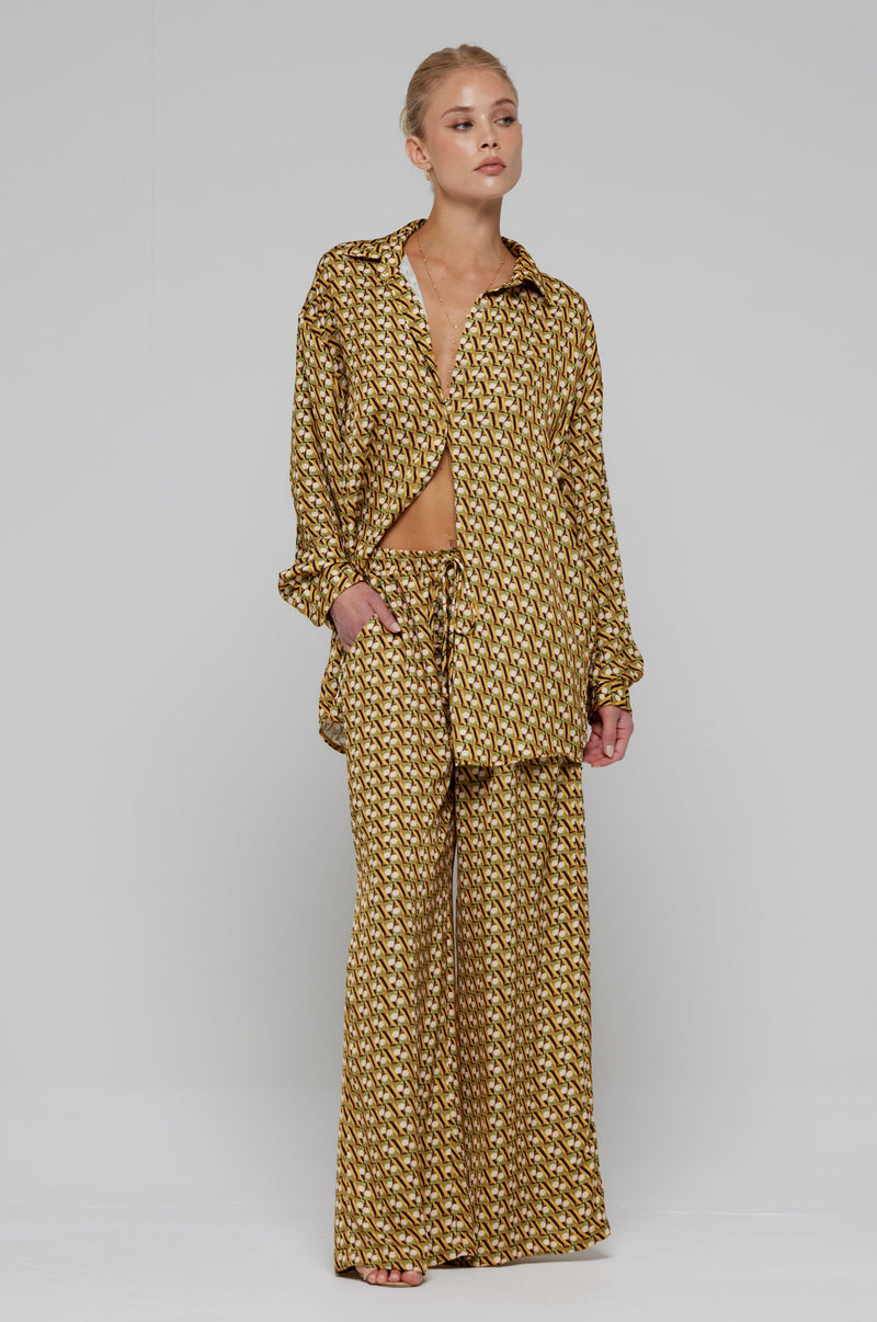 This is an image of Monica Blouse in Zuma - RESA featuring a model wearing the dress