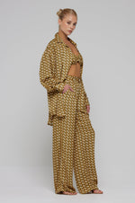 This is an image of Monica Blouse in Zuma - RESA featuring a model wearing the dress