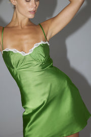 This is an image of Narah Mini in Jade - RESA featuring a model wearing the dress