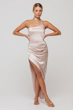 This is an image of Nicole Midi in Champagne - RESA featuring a model wearing the dress