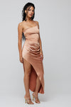This is an image of Nicole Midi in Copper - RESA featuring a model wearing the dress