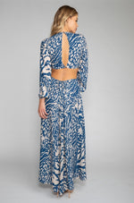 This is an image of Noelle Maxi - RESA featuring a model wearing the dress