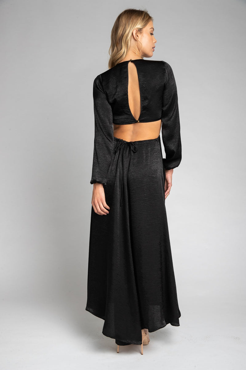 This is an image of Noelle Maxi - RESA featuring a model wearing the dress