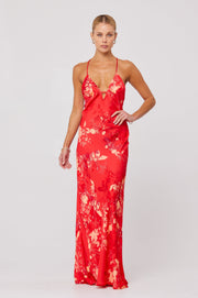 This is an image of Penelope Maxi in Blossom - RESA featuring a model wearing the dress