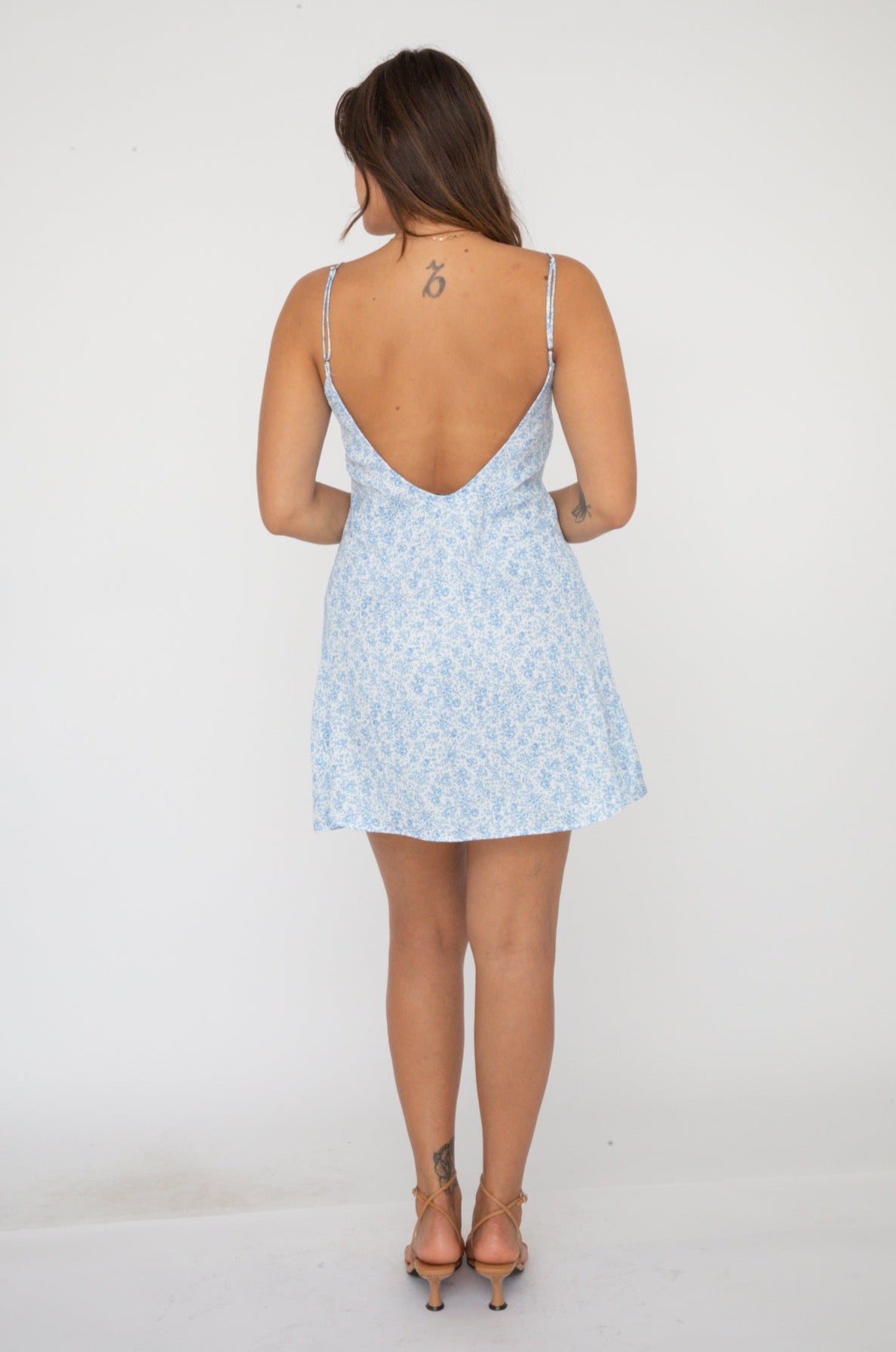 This is an image of Penny Mini - RESA featuring a model wearing the dress