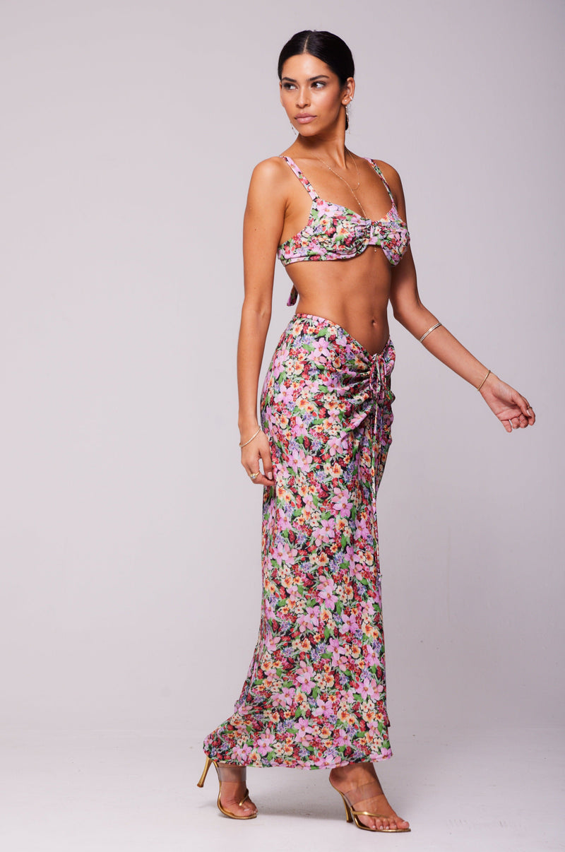 This is an image of Pepper Bra Top in Bloom - RESA featuring a model wearing the dress