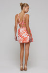 This is an image of Pepper Bra Top in Clementine - RESA featuring a model wearing the dress
