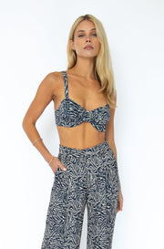 This is an image of Pepper Bra Top in Zeppelin - RESA featuring a model wearing the dress
