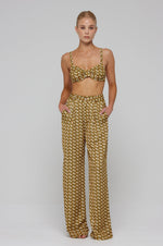 This is an image of Pepper Bra Top in Zuma - RESA featuring a model wearing the dress
