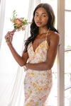 This is an image of Pfeiffer Dress in Gardenia - RESA featuring a model wearing the dress