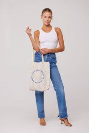This is an image of Resa Tote Bag - RESA featuring a model wearing the dress