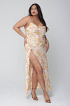 This is an image of River Slip in Gardenia - RESA featuring a model wearing the dress