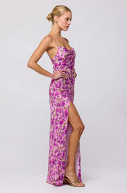 This is an image of River Slip in Lilac - RESA featuring a model wearing the dress