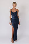 This is an image of River Slip in Navy - RESA featuring a model wearing the dress