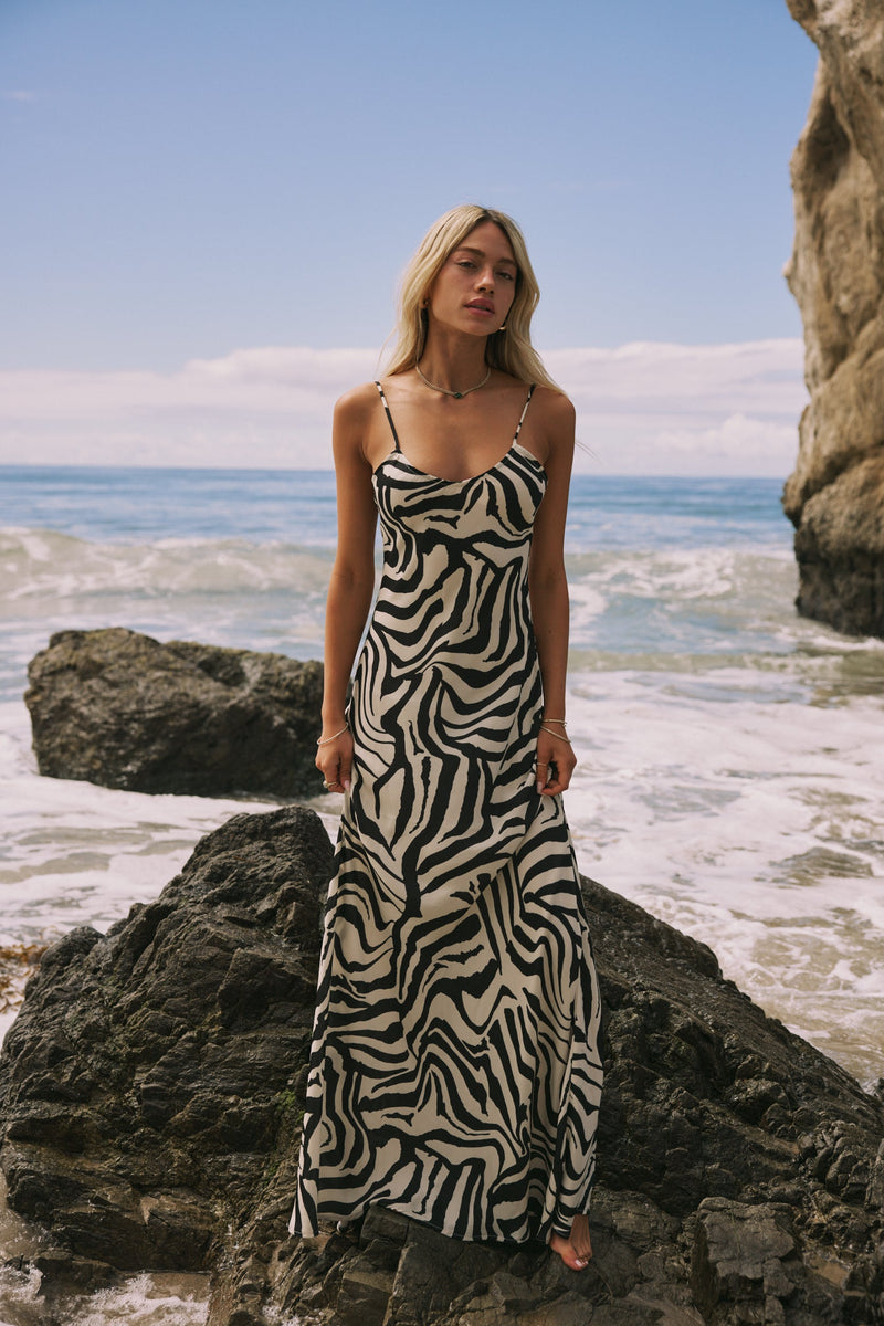 This is an image of Rose Maxi in Tigris - RESA featuring a model wearing the dress