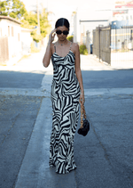 This is an image of Rose Maxi in Tigris - RESA featuring a model wearing the dress