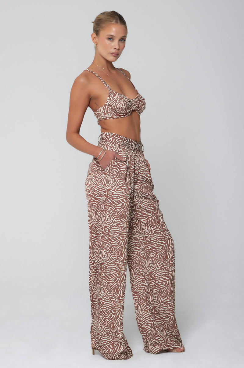 This is an image of Sasha Trouser in Dallas - RESA featuring a model wearing the dress