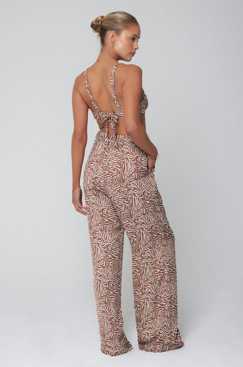 This is an image of Sasha Trouser in Dallas - RESA featuring a model wearing the dress