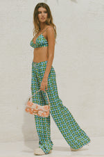 This is an image of Sasha Trouser in Oasis - RESA featuring a model wearing the dress