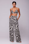 This is an image of Sasha Trouser in Tigris - RESA featuring a model wearing the dress