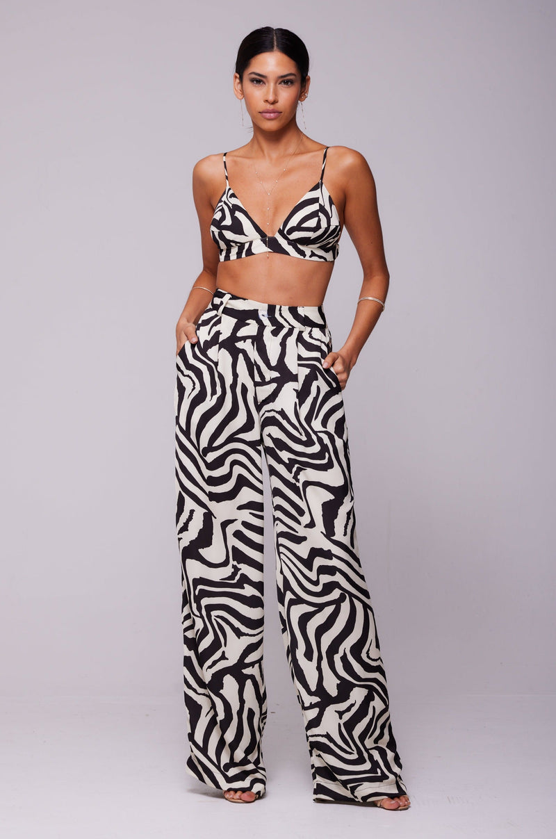 This is an image of Sasha Trouser in Tigris - RESA featuring a model wearing the dress