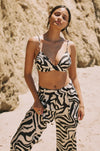 This is an image of Sasha Trouser in Tigris - RESA featuring a model wearing the dress