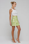 This is an image of Scarlett Skirt in Lotus - RESA featuring a model wearing the dress